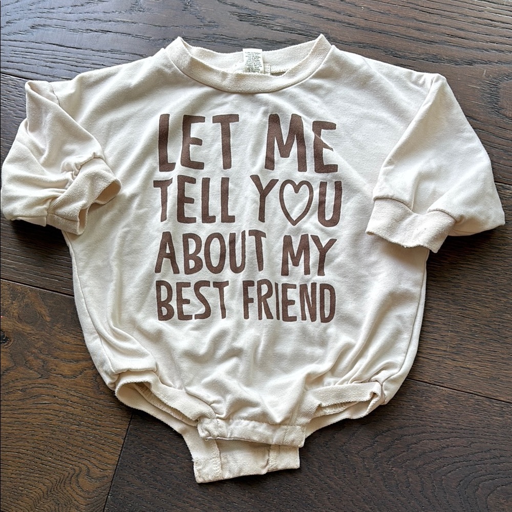 Cream Baby Onesie with Brown Text